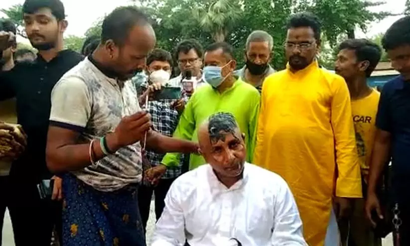 Ashis Das head shaved Ashis Das head shaved