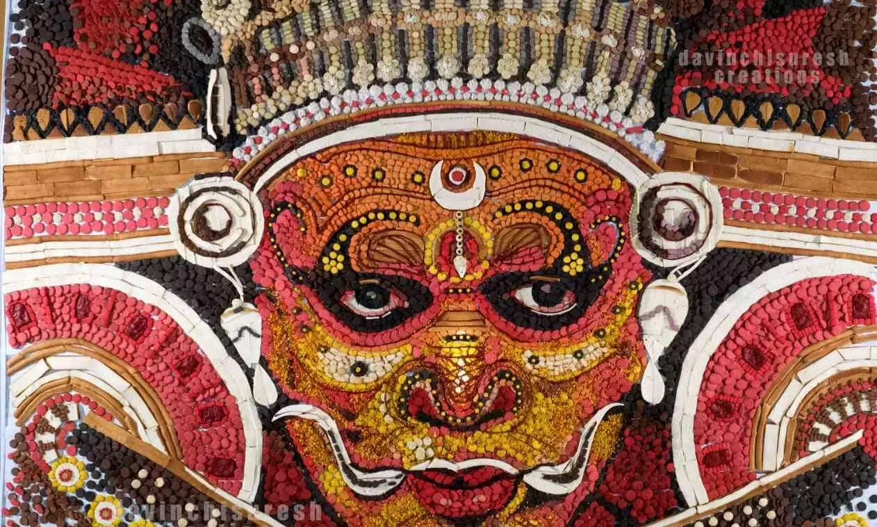 ബേക്കറി ബിസ്ക്കറ്റിൽ ഭീമൻ തെയ്യമൊരുക്കി ഡാവിഞ്ചി സുരേഷ് ബേക്കറി ബിസ്ക്കറ്റിൽ ഭീമൻ തെയ്യമൊരുക്കി ഡാവിഞ്ചി സുരേഷ്