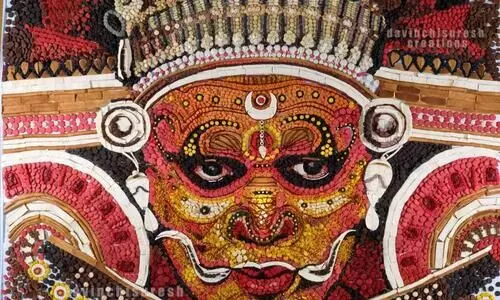 ബേക്കറി ബിസ്ക്കറ്റിൽ ഭീമൻ തെയ്യമൊരുക്കി ഡാവിഞ്ചി സുരേഷ്