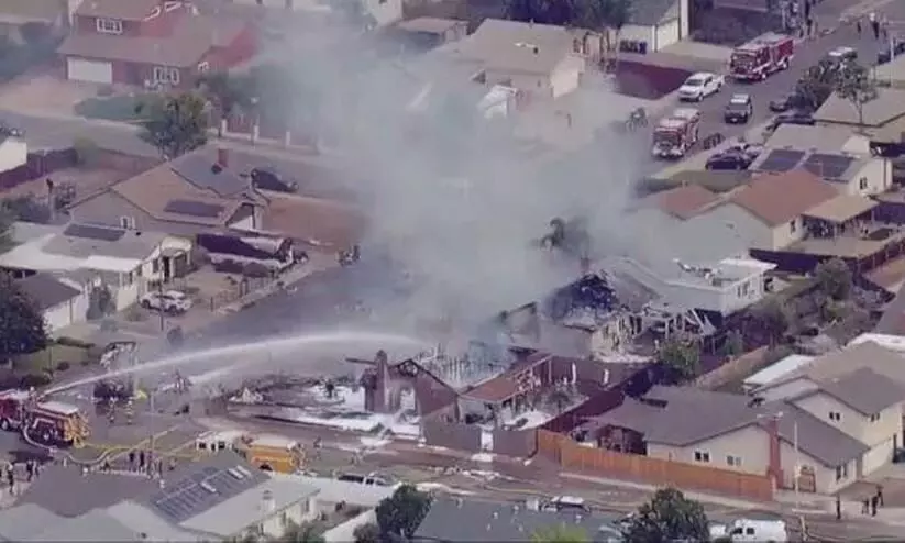 2 Die As Plane Hits Houses In US