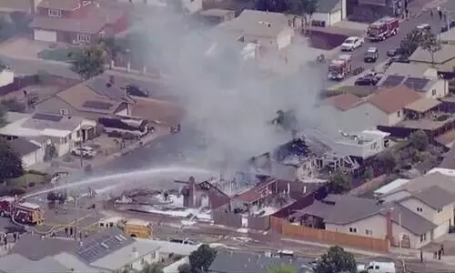 2 Die As Plane Hits Houses In US