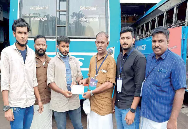 Bus staff with charitable work