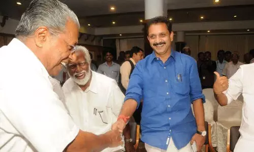 pinarayi vijayan k surendran