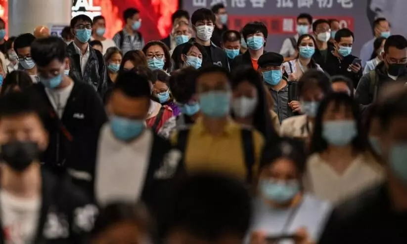 Thousands under lockdown as China moves to curb latest Covid outbreak