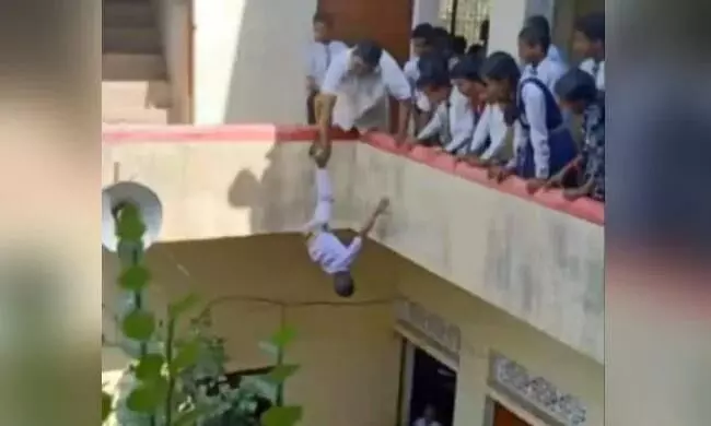 Viral Video Of Class 2 Boy Dangled By Foot Leads To UP Principals Arrest