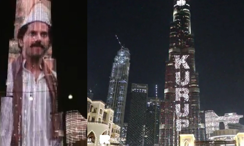 കുറുപ്പ് ബുർജിൽ തെളിഞ്ഞു; സാക്ഷിയായി ദുൽഖറും കുടുംബവും