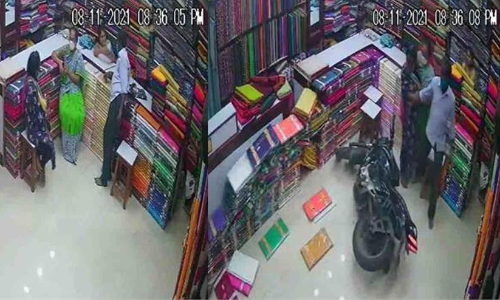 Out of control motorcycle crashes into clothing store in Telangana