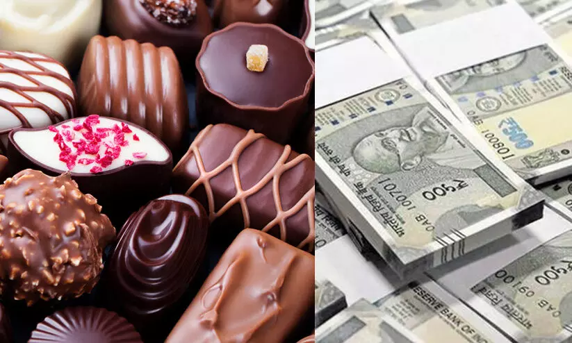 ചോക്ലേറ്റ് വിൽപനയുടെ മറവിൽ കുഴൽപ്പണക്കടത്ത്: രണ്ടു യുവാക്കൾ പിടിയിൽ ചോക്ലേറ്റ് വിൽപനയുടെ മറവിൽ കുഴൽപ്പണക്കടത്ത്: രണ്ടു യുവാക്കൾ പിടിയിൽ