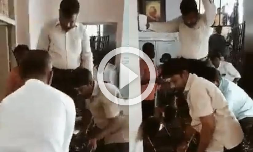 കാൽ നനയാതിരിക്കാൻ കസേരയിൽ ചവിട്ടി എം.പി കാറിനടുത്തേക്ക്...