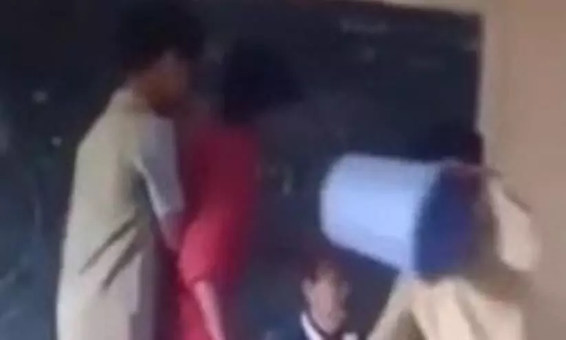 Students assault teacher put dustbin on head probe ordered