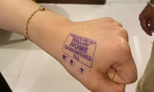 വി​ദേ​ശ​ത്തു​നി​ന്ന്​ വന്നാൽ ഒ​രാ​ഴ്ച പുറത്തിറങ്ങരുത്​; ലംഘിച്ചാൽ ക​ർ​ശ​ന ന​ട​പ​ടി, കൈകളിൽ സീൽ പതിപ്പിക്കാനും കർണാടകയിൽ നീക്കം