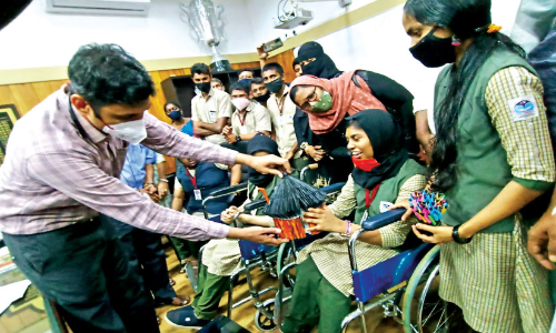 Differently abled children with paper pen Delivered to Collector