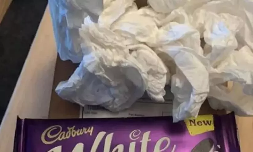 chocolate bars wrapped in toilet paper