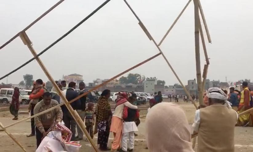 Hoardings of BJP Rally Uprooted for Firewood