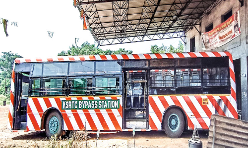 Lets wait for the bus on the bus