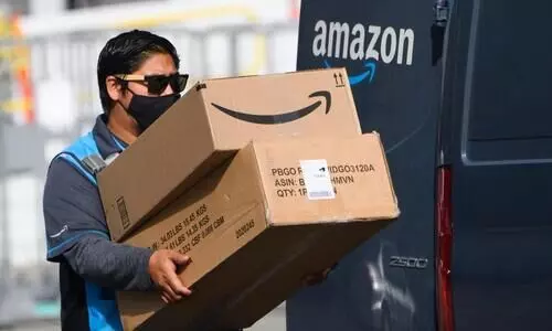 കോ​വി​ഡ് നി​രീ​ക്ഷ​ണം ചു​രു​ക്കി; ആ​മ​സോ​ണി​ൽ ജീവന​ക്കാ​ർ​ക്ക് ശ​മ്പ​ള​ത്തോ​ടു കൂ​ടി ലീ​വ്