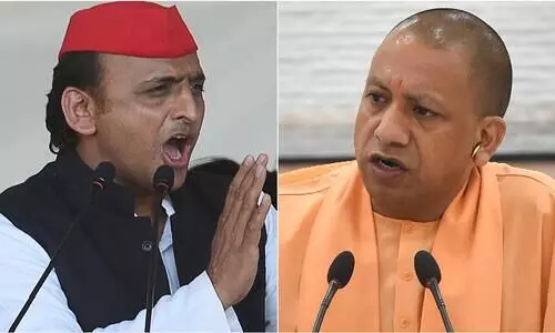 akhilesh yadv and yogi adithyanth
