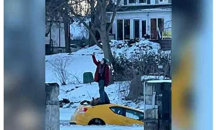 Canadian Woman Snaps Selfie On Sinking Car