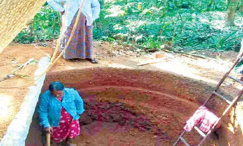 Women undertaking well construction