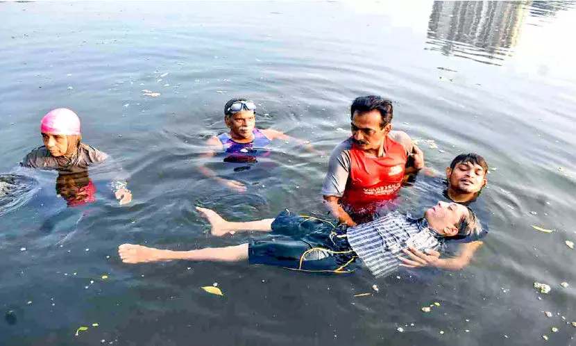 They are getting ready to swim across the Periyar