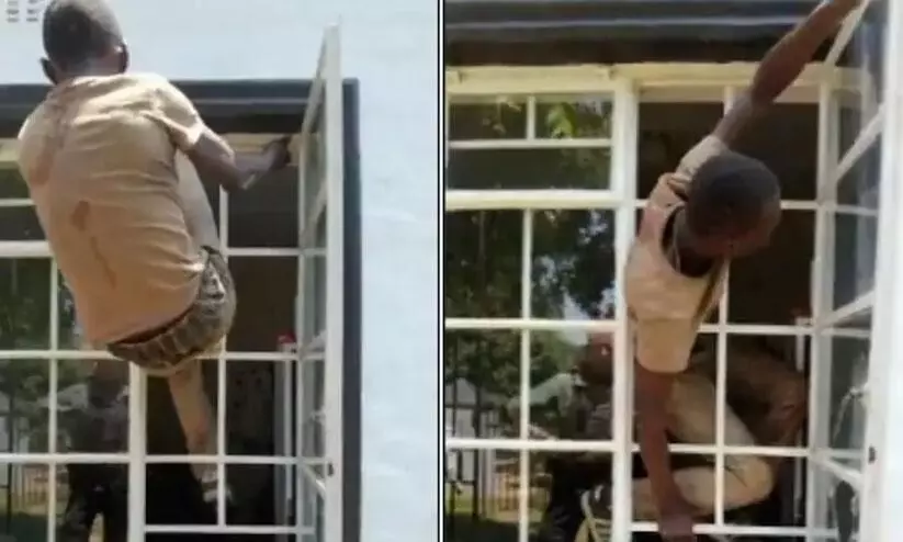 അൽപം തടിച്ച പൂച്ച പോലും സുല്ലിടുന്ന ജനലഴിയിലൂടെ നൂഴ്ന്നിറങ്ങി കള്ളൻ അൽപം തടിച്ച പൂച്ച പോലും സുല്ലിടുന്ന ജനലഴിയിലൂടെ നൂഴ്ന്നിറങ്ങി കള്ളൻ