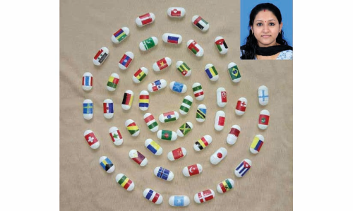 കാത്സ്യം ഗുളികയിൽ വർണപ്പതാകകൾ; പ്രിയങ്ക ഏഷ്യ ബുക്ക് ഓഫ് റെക്കോഡിൽ