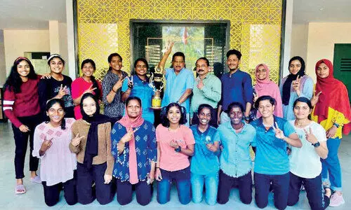 Champion team arrives to pay tribute to dear teacher