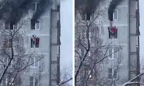 തീപടരുന്ന കെട്ടിടത്തിന്റെ ഒമ്പതാംനിലയിൽനിന്ന് യുവതിയെ അതിസാഹസികമായി രക്ഷിച്ച് യുവാക്കൾ -വിഡിയോ