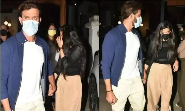 hrithik roshan grabs rumoured girlfriends hand as he walks out of a cafe with her