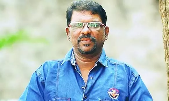 മുരുകൻ നായർക്ക് അഭിനന്ദനം; കവി മുരുകൻ കാട്ടാക്കടയെയും മലയാളം മിഷനെയും ട്രോളി സോഷ്യൽ മീഡിയ മുരുകൻ നായർക്ക് അഭിനന്ദനം; കവി മുരുകൻ കാട്ടാക്കടയെയും മലയാളം മിഷനെയും ട്രോളി സോഷ്യൽ മീഡിയ