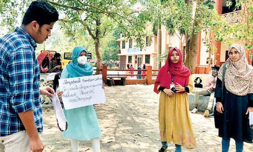 Protest against Ramachandran Commission report depriving students of travel rights