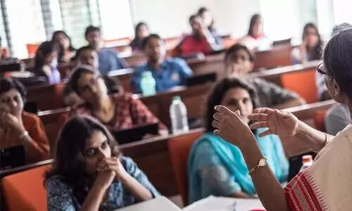 You can wear any clothing that is comfortable and dignified; Sarees are no longer mandatory for B.Ed students