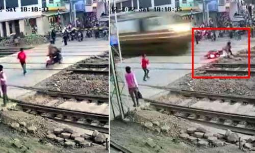 Narrow escape for a man-in-hurry as Rajdhani Express train crushes his bike