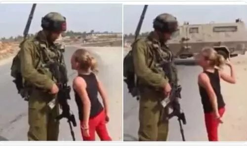 സൈനികനെ ഇടിച്ച ധീരയായ പെൺകുട്ടി യുക്രെയ്​നിയല്ല; ഇവൾ ഫലസ്​തീനിലെ പെൺപുലി -VIDEO