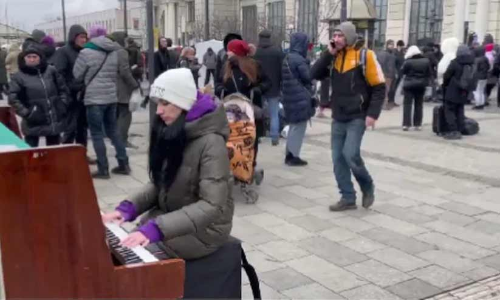 Woman Playing Piano amid war