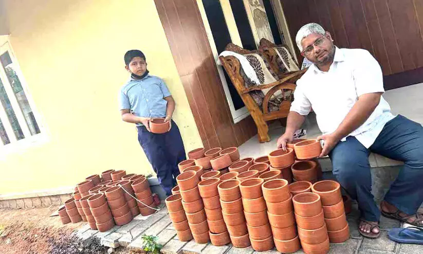 The teacher prepared earthenware to quench the thirst of the birds