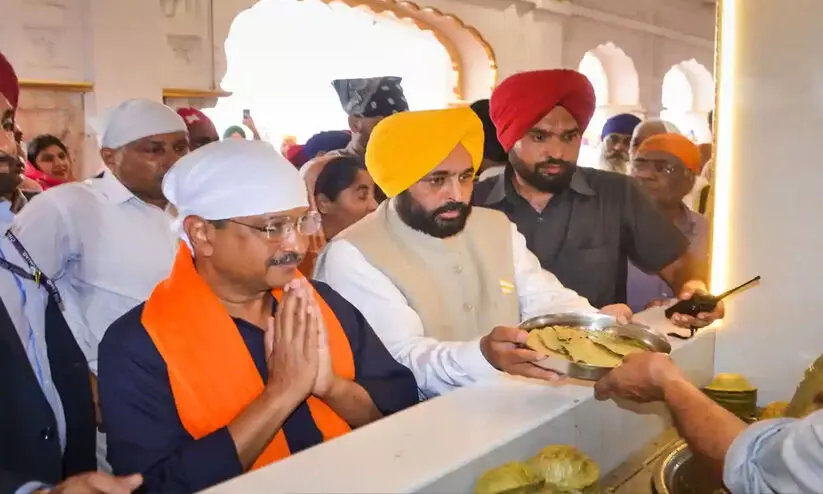 അരവിന്ദ് കേജ്രിവാളിനൊപ്പം സുവർണ ക്ഷേത്രം സന്ദർശിച്ച് മാൻ