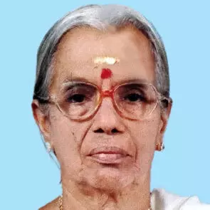 രാ​ധ ടീ​ച്ച​ർ