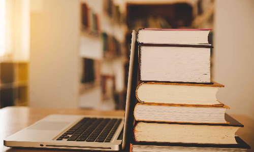 Textbooks and Laptop