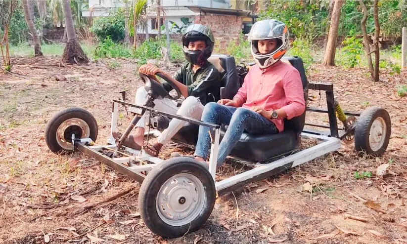 School students building a sports car
