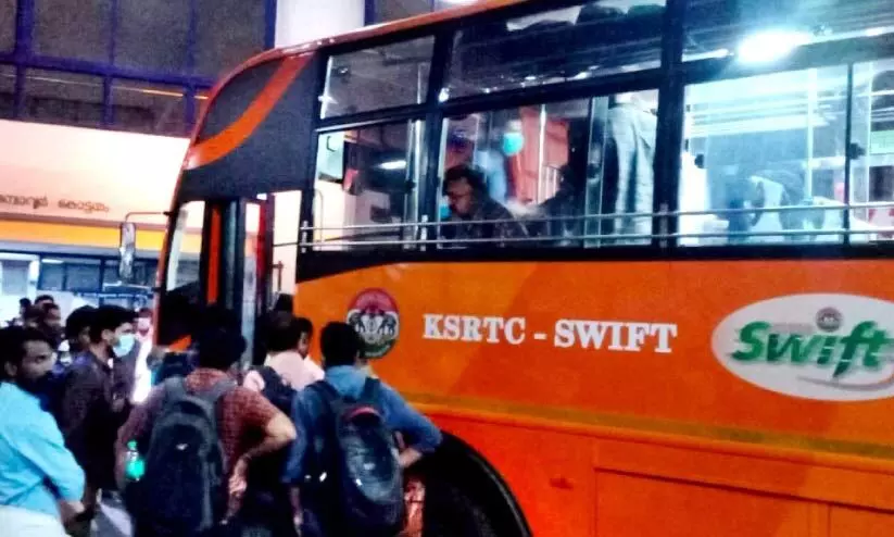 Kozhikode Bangalore passengers waiting for Swifts Gajaraja sleeper bus