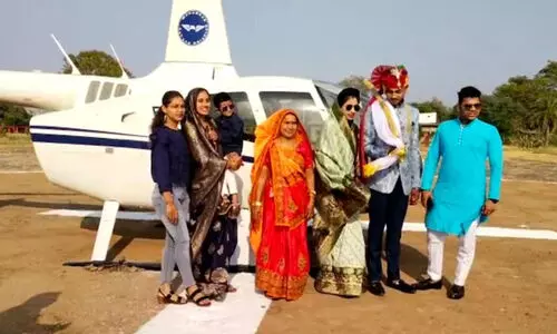 മന്ത്രിമാർ മാത്രം സഞ്ചരിച്ചാൽ മതിയോ? വധൂവരന്മാരെ കൊണ്ടുവരാൻ ഹെലികോപ്റ്റർ ഏർപ്പെടുത്തി കർഷകൻ