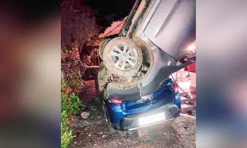 Car overturned on the porch of the house