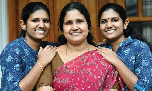 engineering service exam, deaf twins win ies exam, paravathi and lakshmi