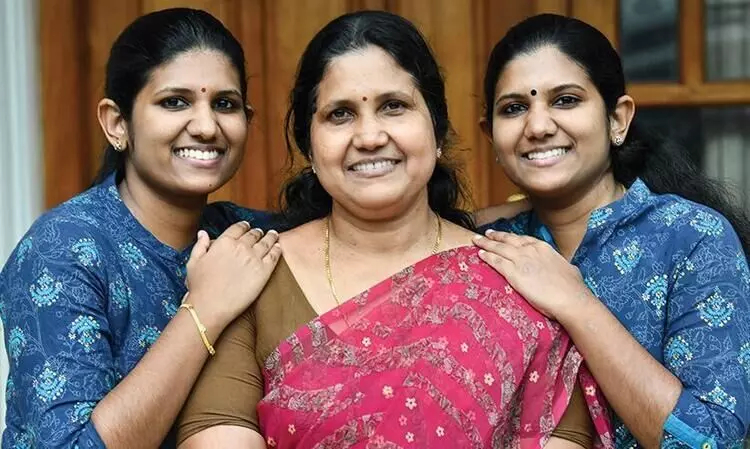 engineering service exam, deaf twins win ies exam, paravathi and lakshmi