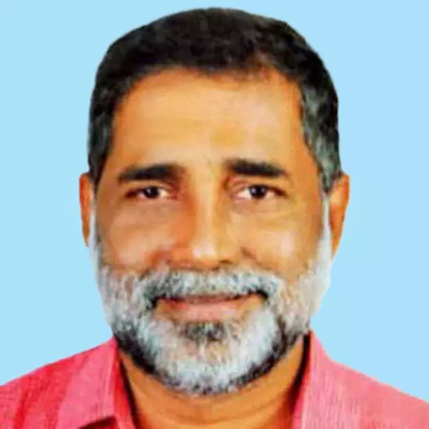 തോ​പ്പി തി​ല​ക​ൻ