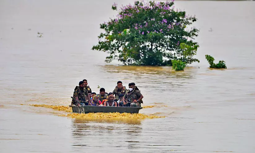 അസം വെള്ളപ്പൊക്കത്തിൽ ആകെ മരണം 25 ആയി അസം വെള്ളപ്പൊക്കത്തിൽ ആകെ മരണം 25 ആയി