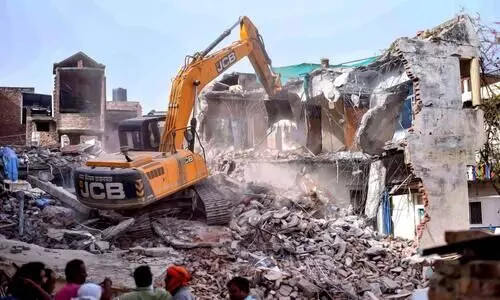 ബു​​ൾ​​ഡോ​​സ​​ർ രാ​​ജ്​ തീ​​ർ​​ത്ത ത​​മോ​​ഗ​​ർ​​ത്ത​​ങ്ങ​​ൾ