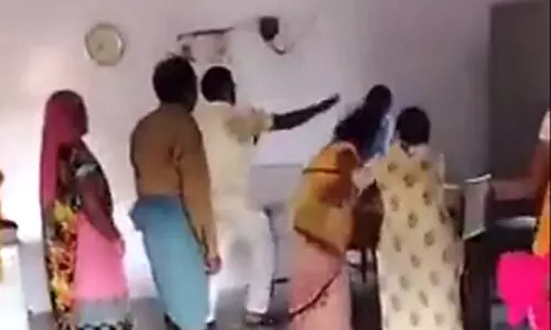 principal thrashes female teacher with shoes