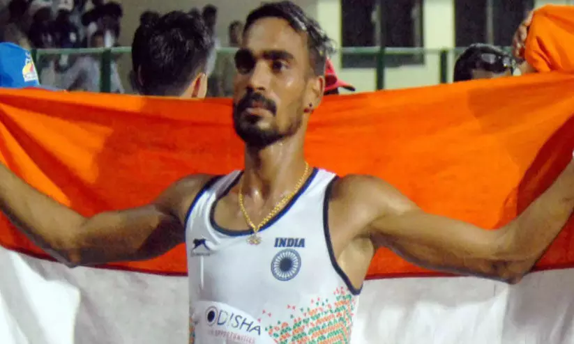 Olympian T. Gopi Olympian T. Gopi